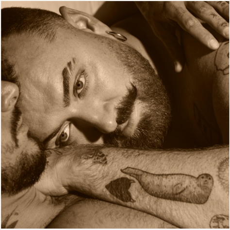 Sam Smith announces their fifth album, Hazel Eyes, releases the romantic new single “My Guy,” and prepares for a special Stonewall Pride performance.